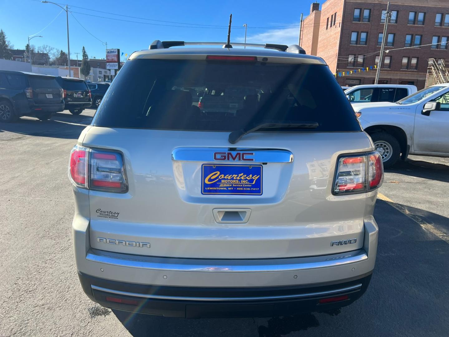 2016 Beige /Charcoal GMC Acadia SLT (1GKKVRKD2GJ) with an 3.6L V6 engine, automatic transmission, located at 116 5th Avenue South, Lewistown, MT, 59457, 47.063877, -109.427879 - Clean local trade with lots of options! Heated leather, sunroof, DVD! - Photo#2